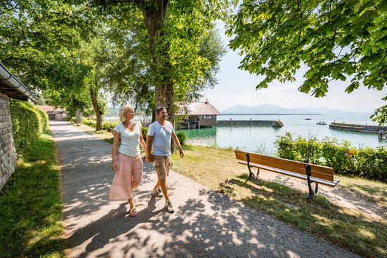 Couple walks on Chiemsee